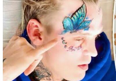 Aaron Carter covers up his face tattoo of the name of his ex, Melanie Martin with a huge butterfly tattoo!